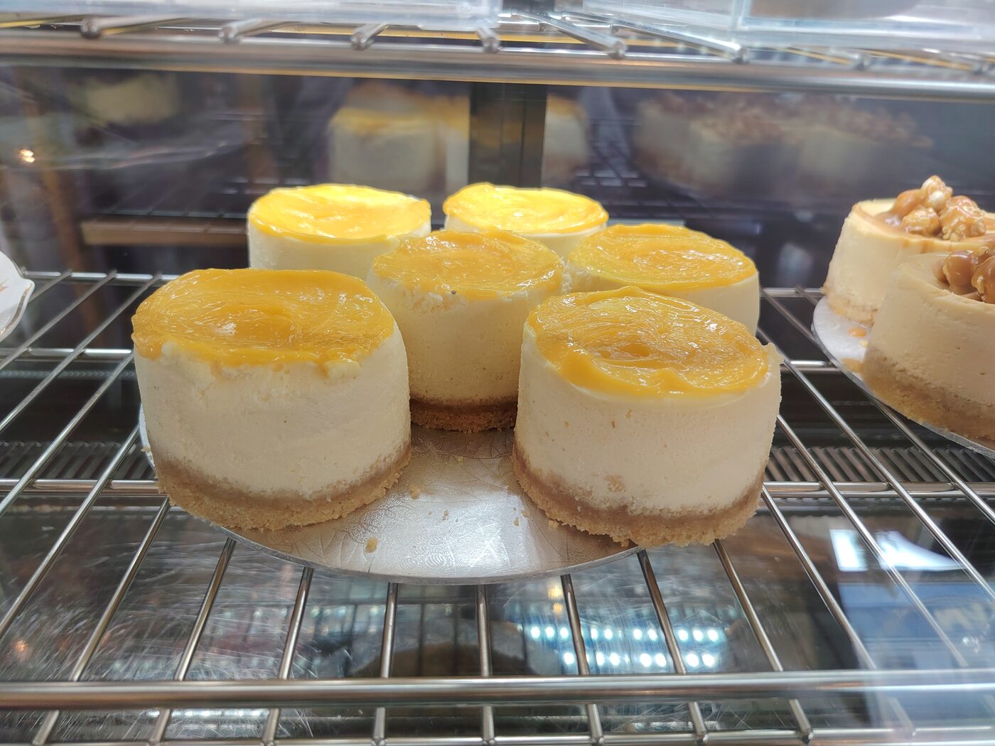 A tray of individual lemon cheesecakes